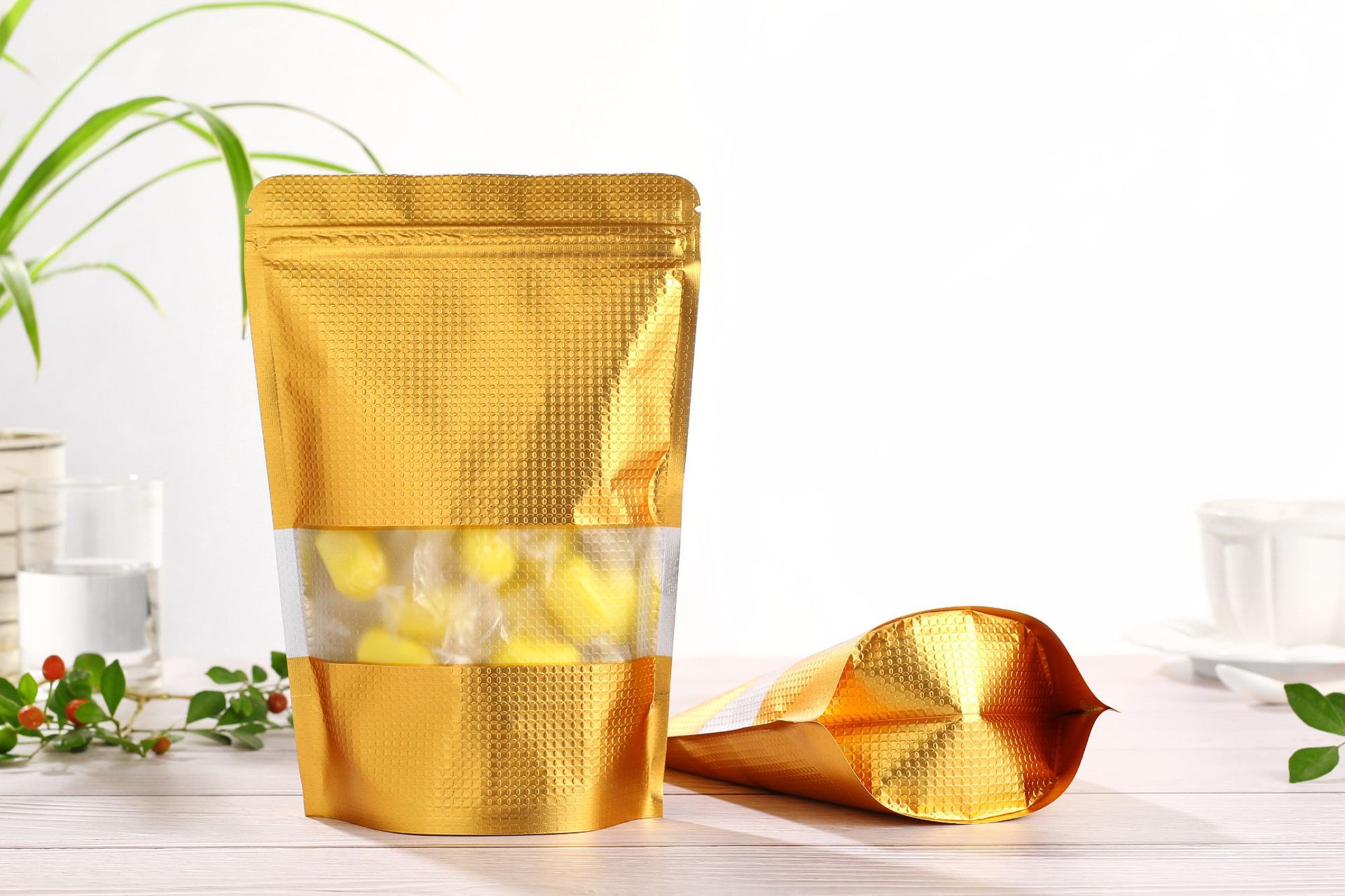 现货金色压纹铝箔袋开窗自立自封袋镀铝拉骨袋零食干果食品包装袋