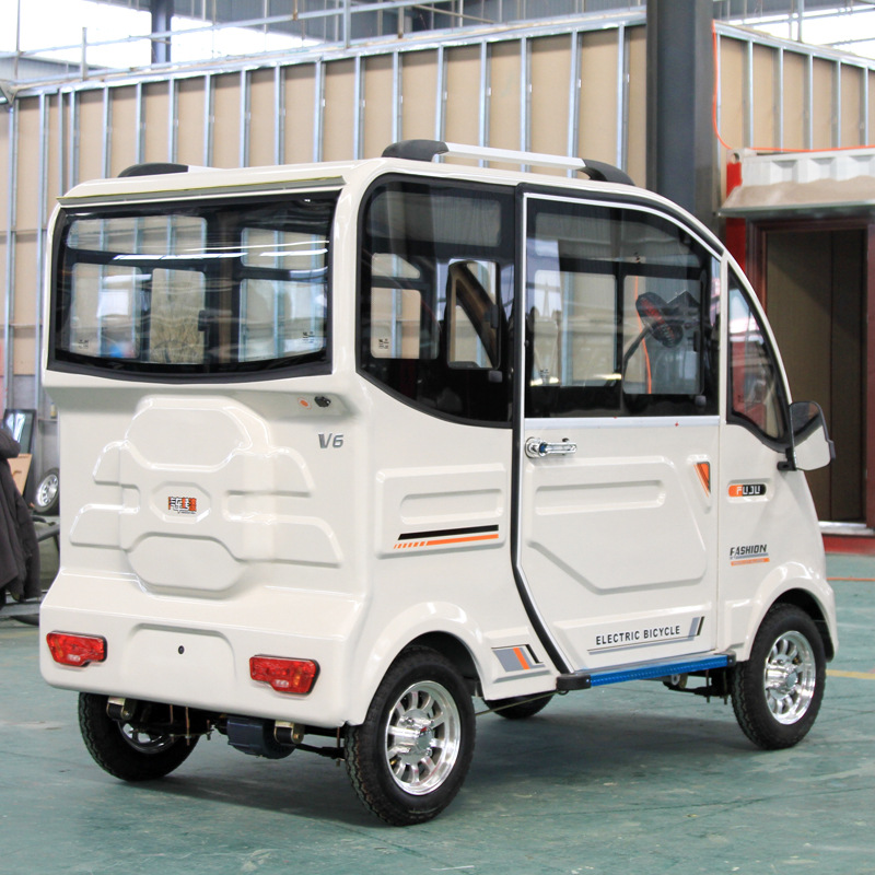 厂家供应电动车全封闭可定制老年残疾代步车接送学生电动四轮车