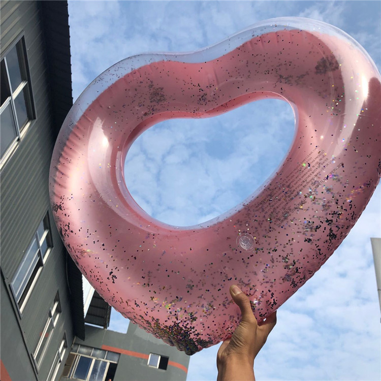 水上用品工厂pvc加厚新款亮片爱心泳圈充气水上成人游泳圈批发