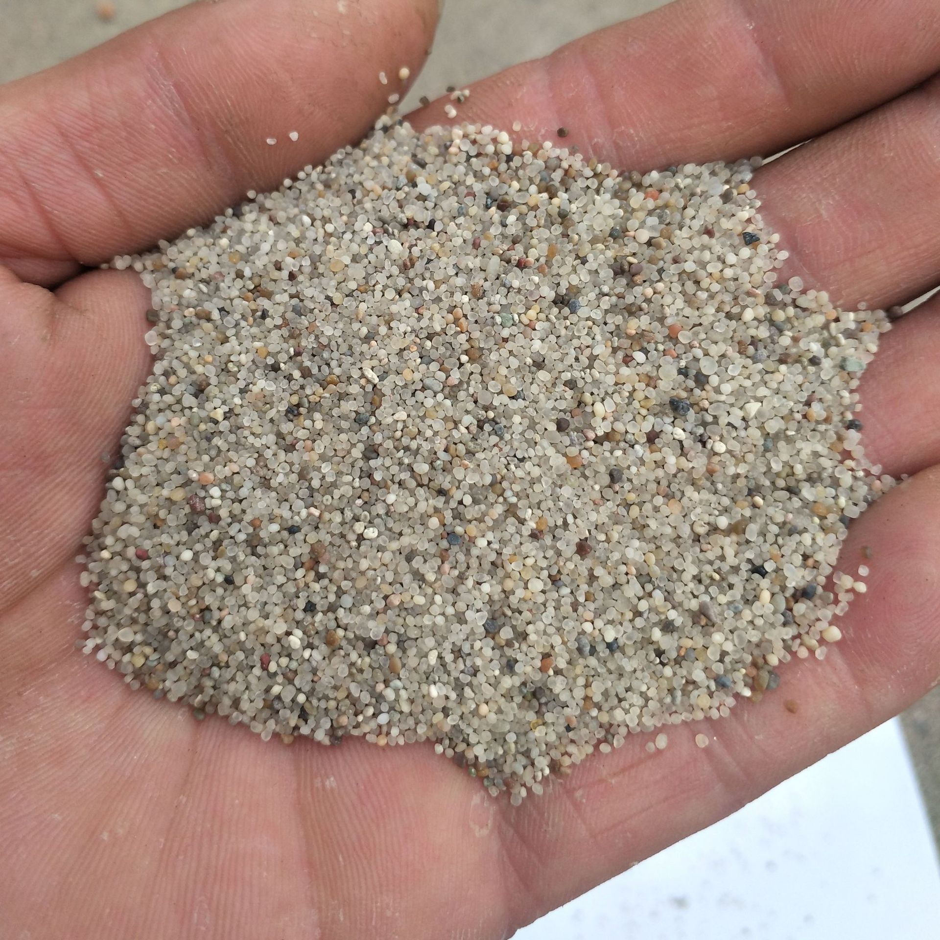 厂家批发儿童乐园沙池用质感圆粒海沙水洗沙 白色沙子 幼儿园用沙