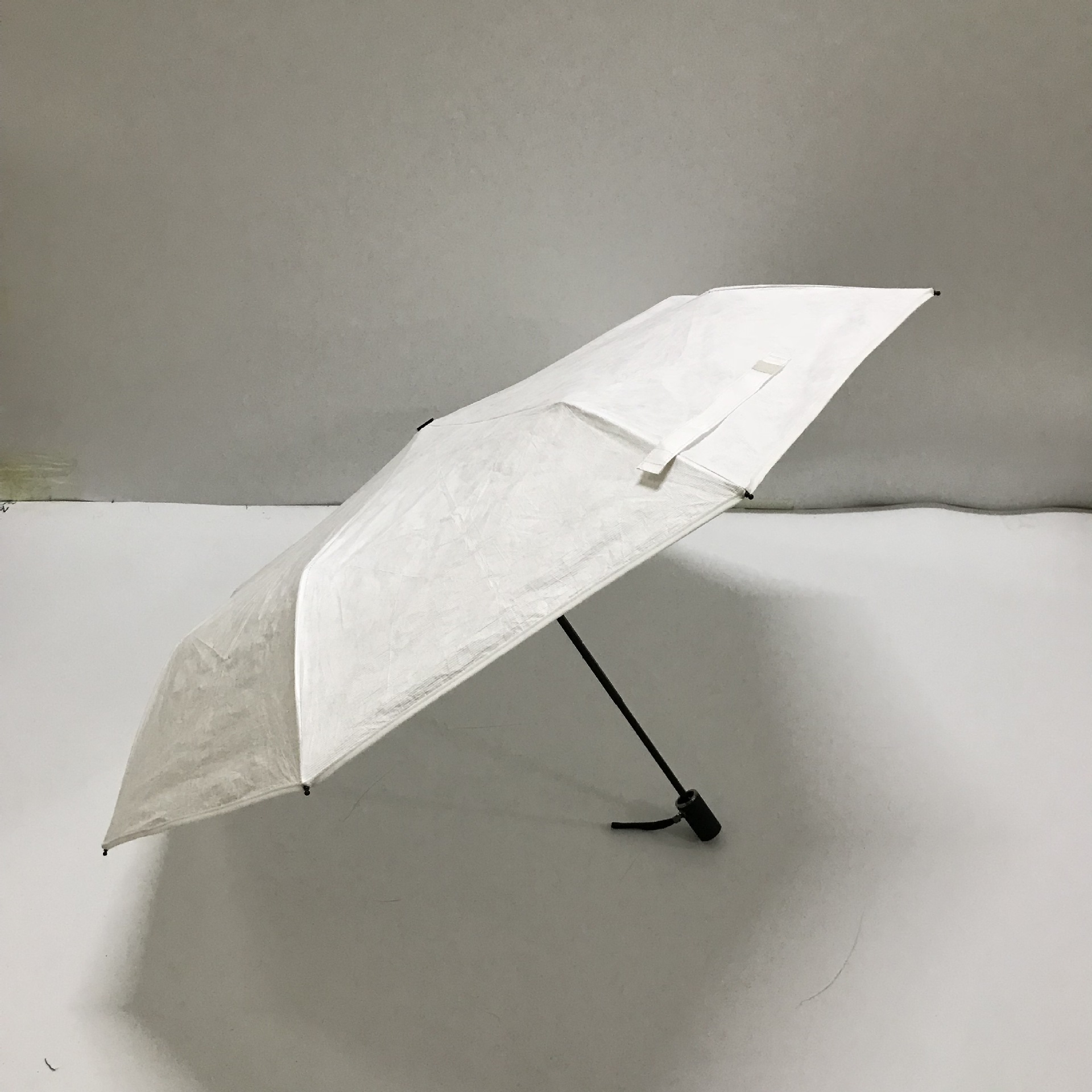 厂家直销特卫强折叠杜邦纸伞印制llogo杜邦授权认证牛皮纸三折伞