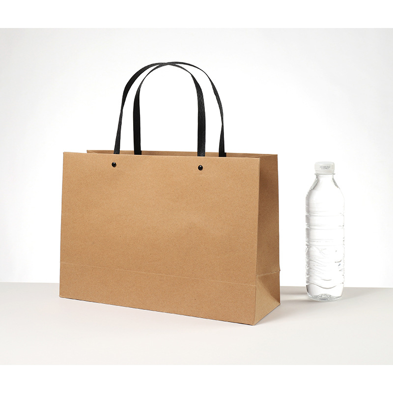 铆钉手提袋礼品袋 黑色手拎纸袋子定做服装包装袋印刷logo