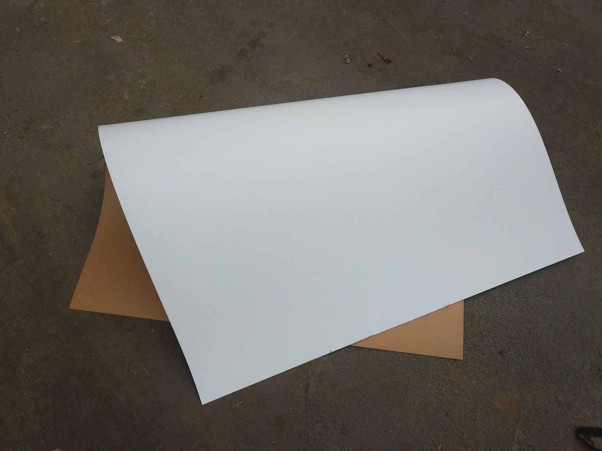 全木浆涂布牛卡纸 牛皮包装纸卷筒 工业用纸服装打版纸厂家批发