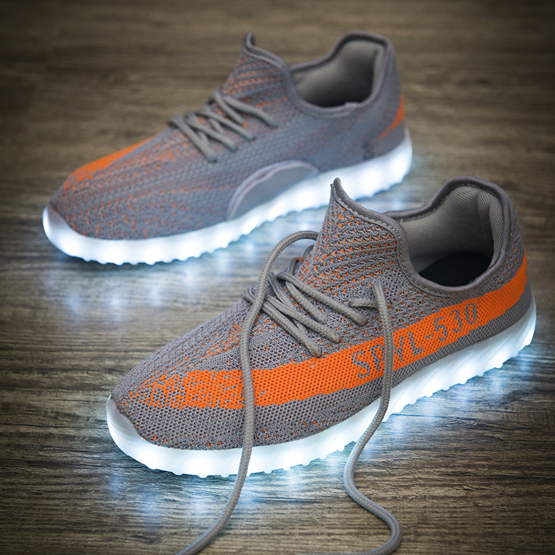 速卖通热款充电鞋时尚情侣发光鞋韩版休闲鬼舞步夜光鞋晋江工厂售