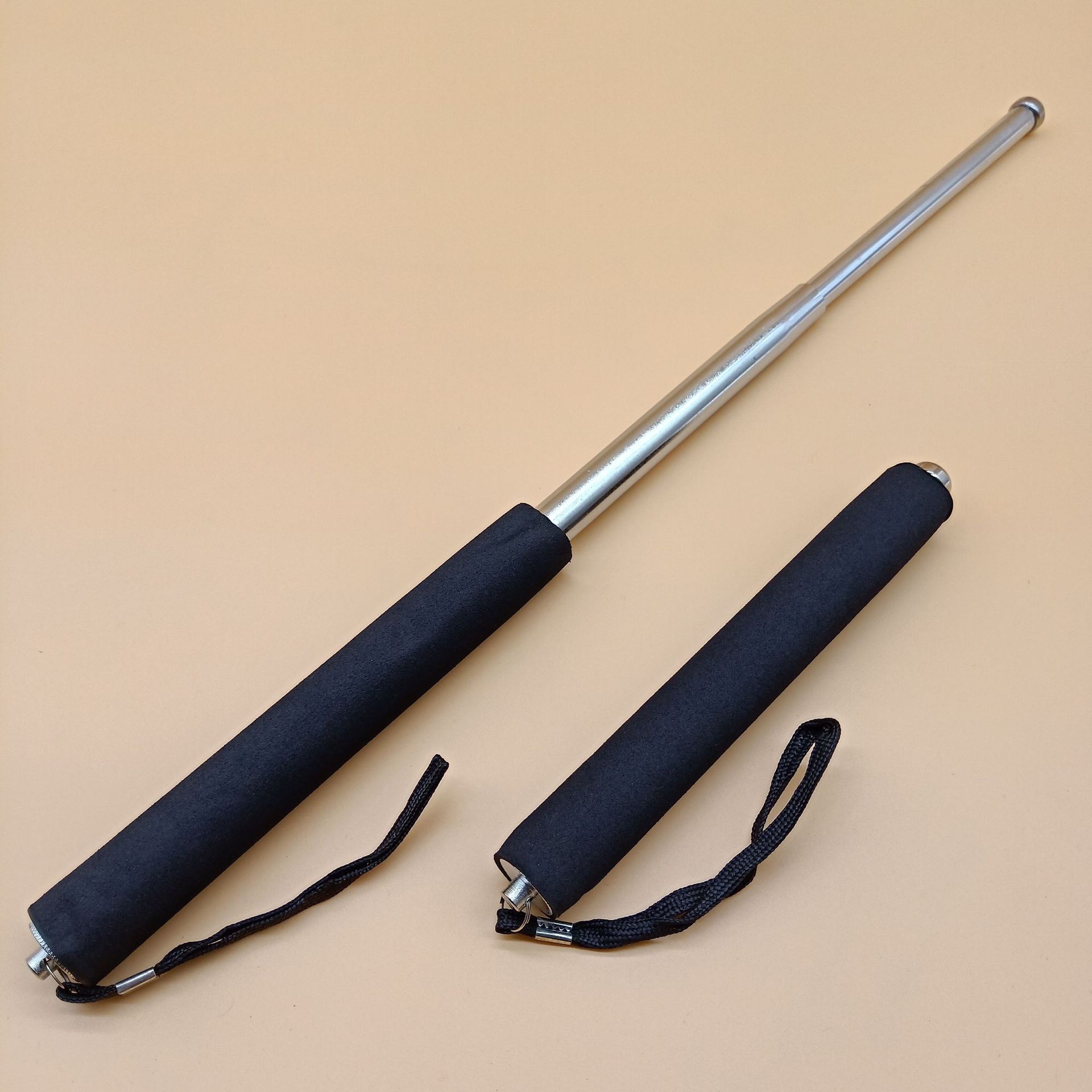 厂家直销新款海绵把防身器材甩棍白三节银伸缩棍可挂式甩棍防身棍