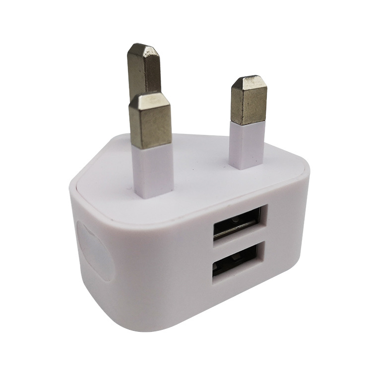 新款充电头三脚英规双usb厂家直销墙充 旅充 通用适配充电器