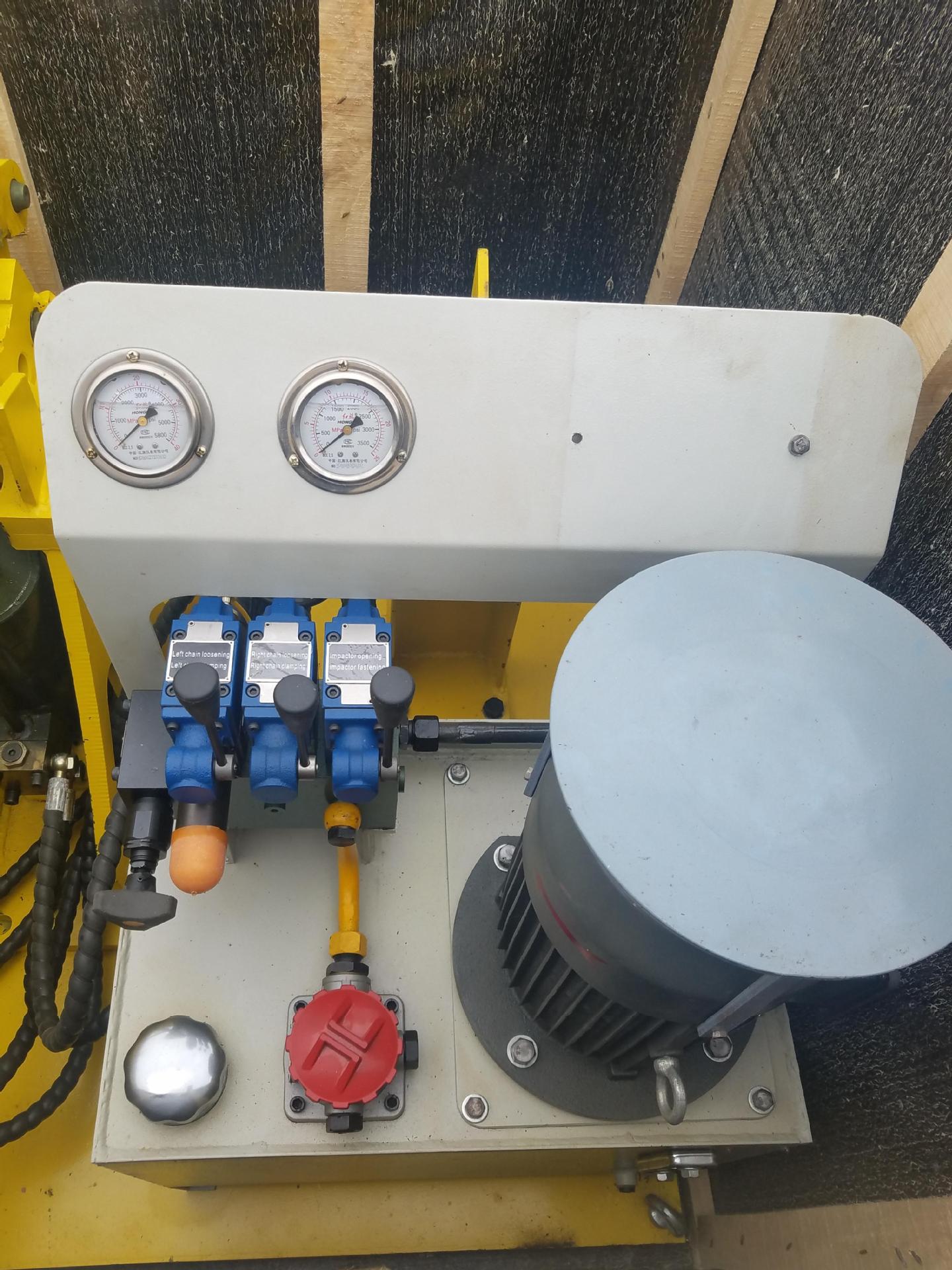 宣化冲击器钎头拆卸台3.5-8寸全液压拆卸台设备自动拆卸冲击器