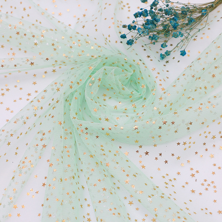 厂家直销星月网纱面料亮片网眼纱连衣裙背景布布料批发热销热卖