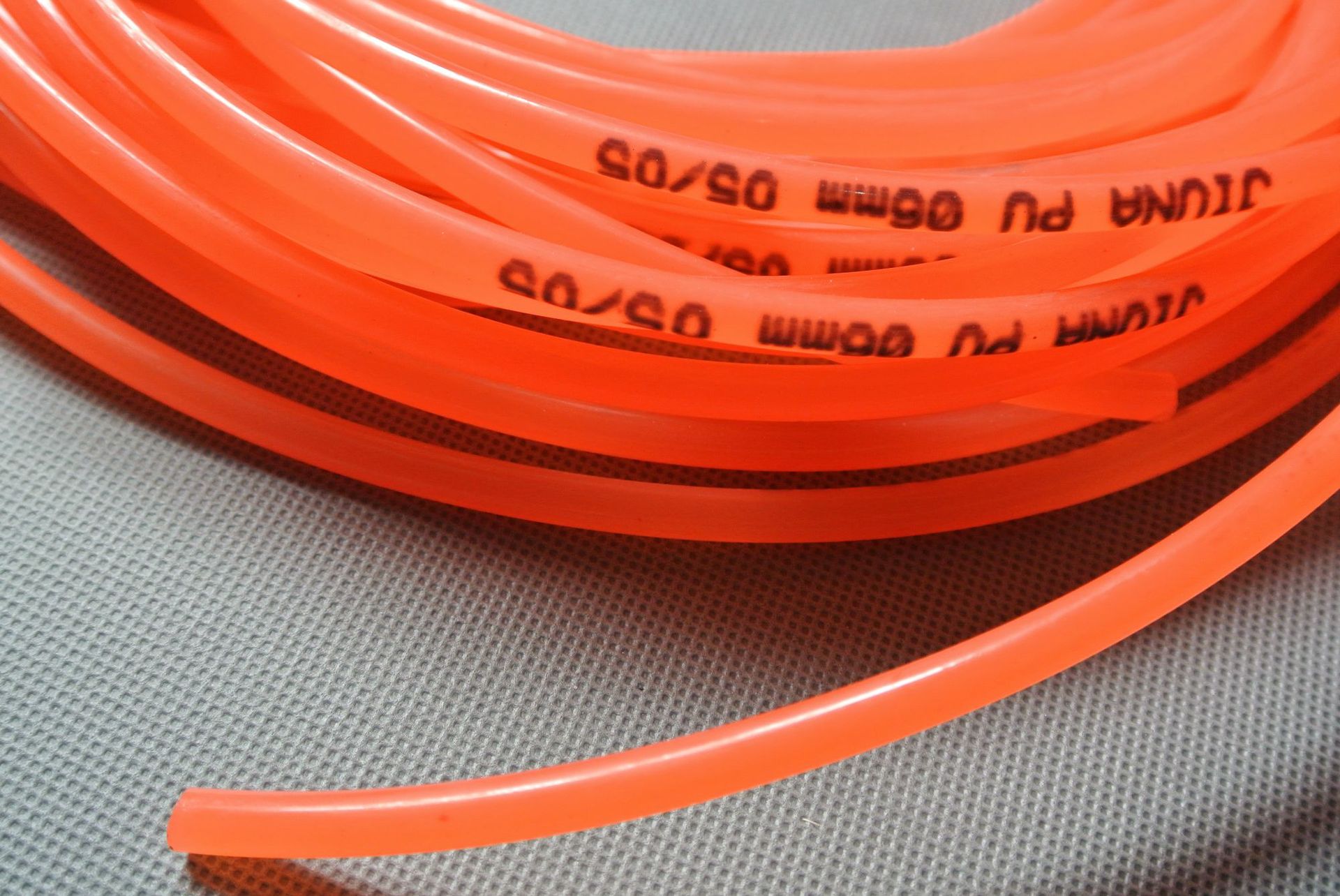 聚氨酯光面圆皮带 粘接圆皮带 橘红pu圆带 自粘接驳聚氨酯圆皮带