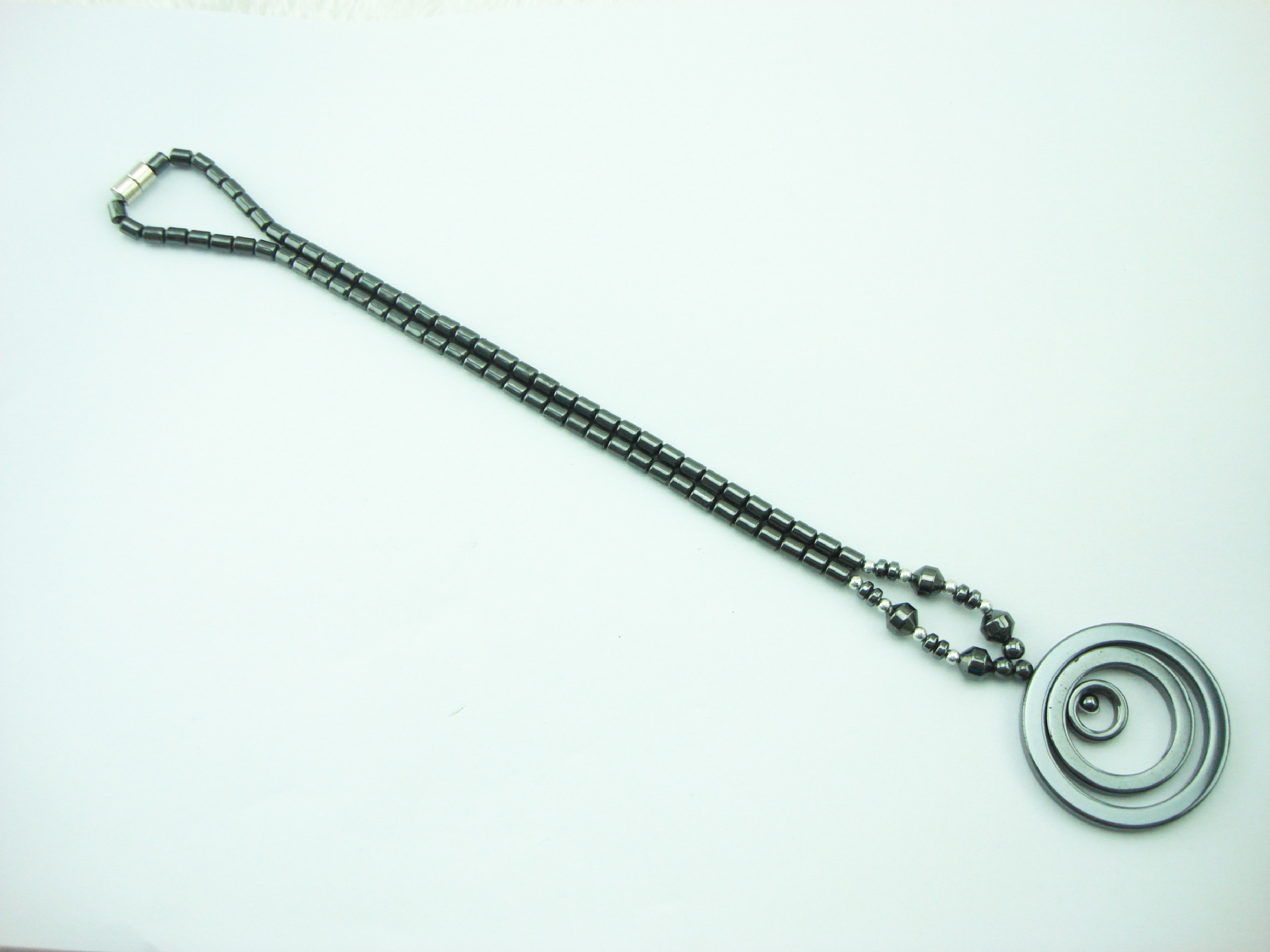 亚马逊跨境厂家直销 多层偏心圆环吊坠磁石项链女式时尚保健项链