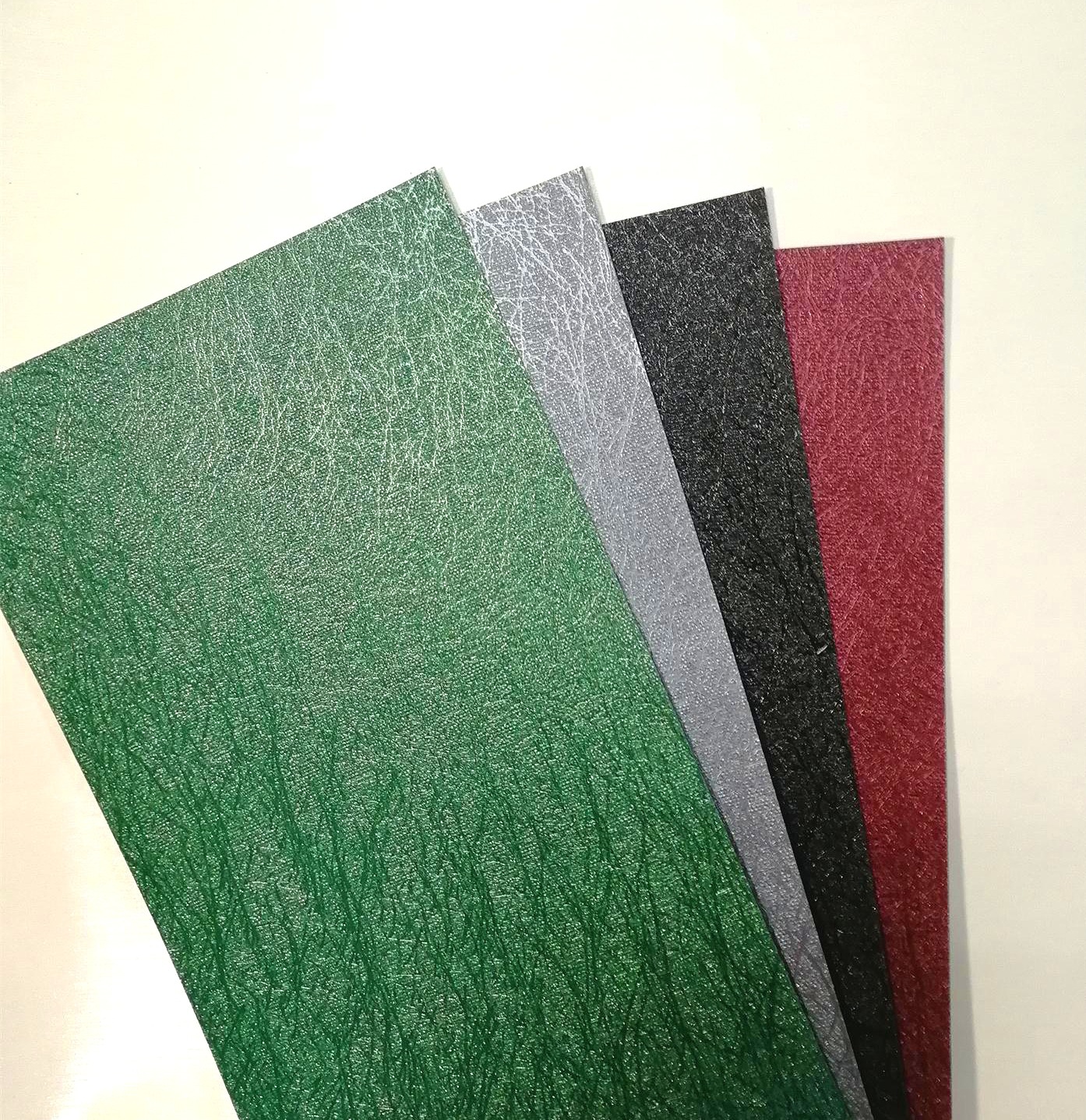 厂直销pvc装帧充皮纸 烫金工艺包装纸材料 功能防水纸拉抻力强