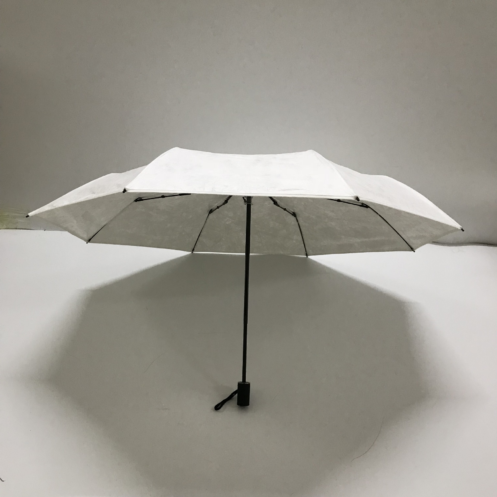 厂家直销特卫强折叠杜邦纸伞印制llogo杜邦授权认证牛皮纸三折伞