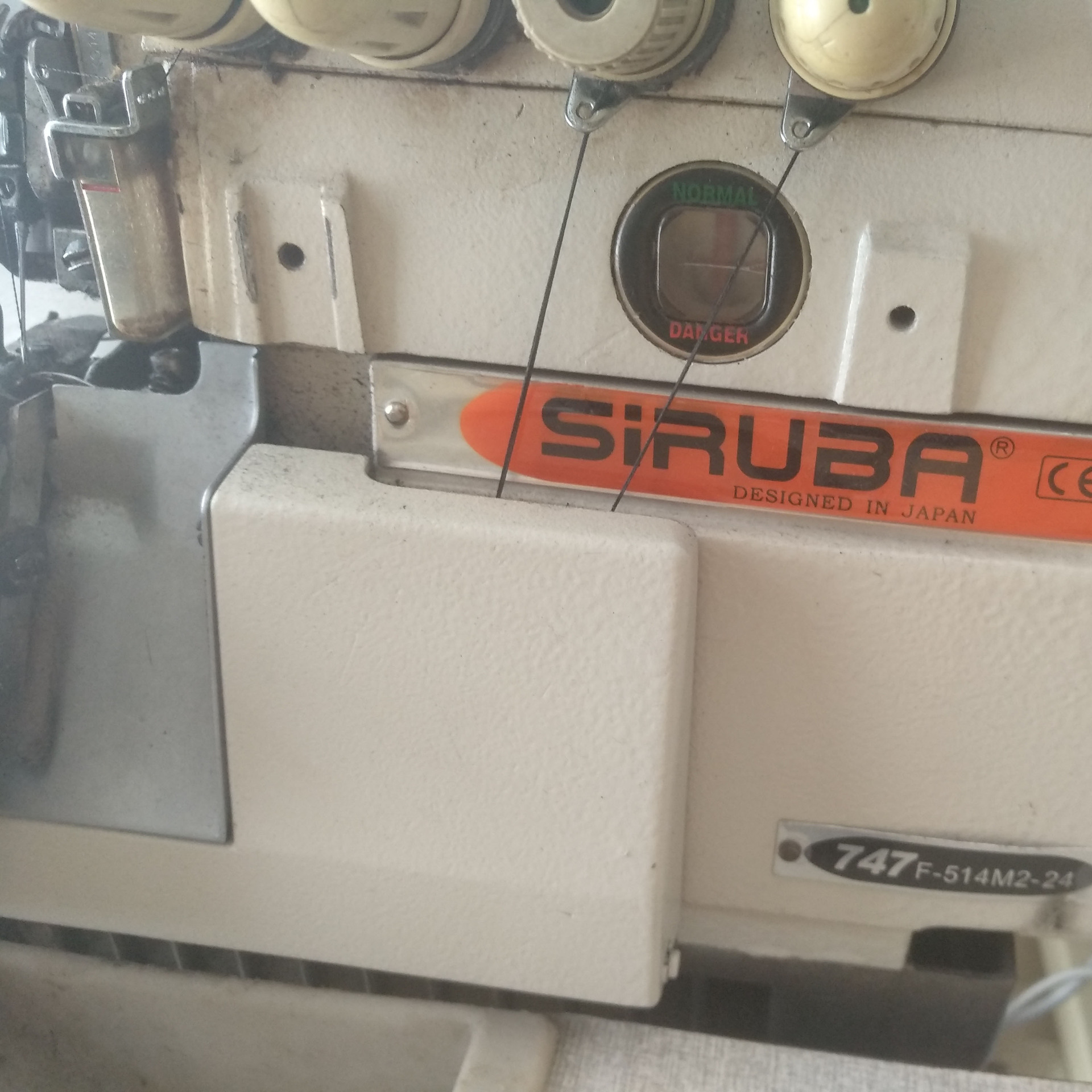 二手节能电动服装四线打边车工业包缝扎骨车银箭747锁边机