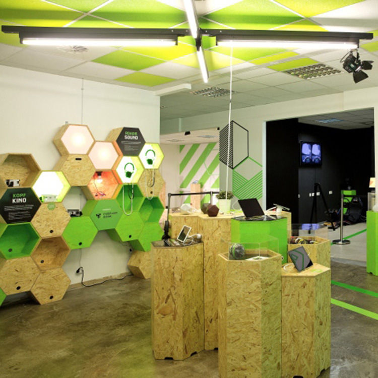 厂家创意蜂巢耳机展示柜手机柜台圆形中岛台木质电子产品展示柜