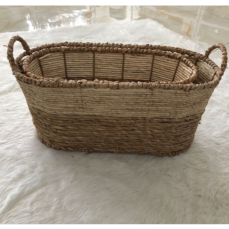 工厂生产2018年家庭廉价的手工椭圆形的玉米皮/草篮可堆叠的篮子