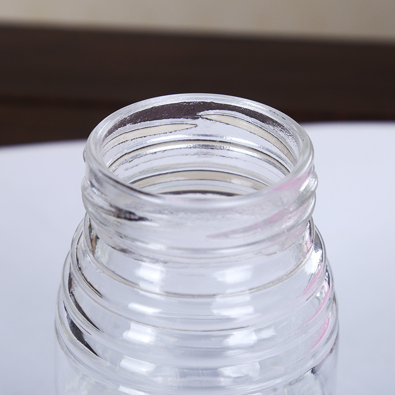 厂家直供创意螺纹蜂蜜玻璃瓶马口铁盖密封玻璃罐250克酱菜瓶批发