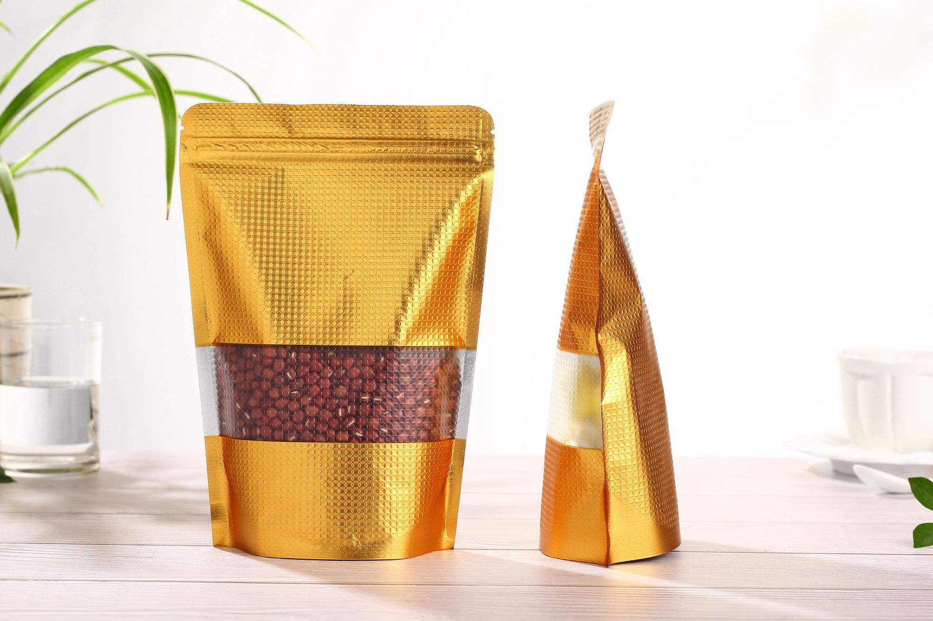 现货金色压纹铝箔袋开窗自立自封袋镀铝拉骨袋零食干果食品包装袋