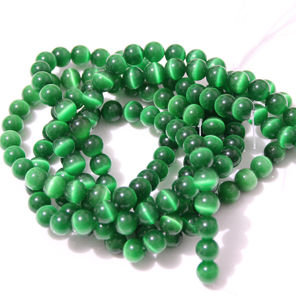 速卖通绿色猫眼石 半成品散珠子饰品配件 圆珠 串珠 diy水晶批发