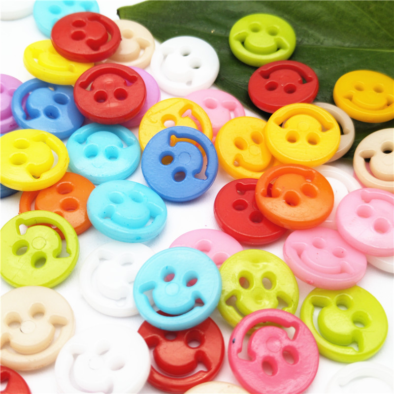 现货直销糖果色开口笑脸卡通纽扣 手工diy彩色两眼圆形塑料纽扣