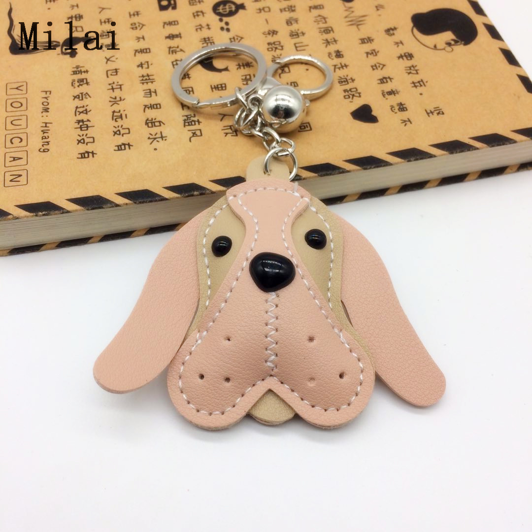 新款上市优质pu皮革刺绣脸谱狗钥匙扣手机包包挂件厂家直销
