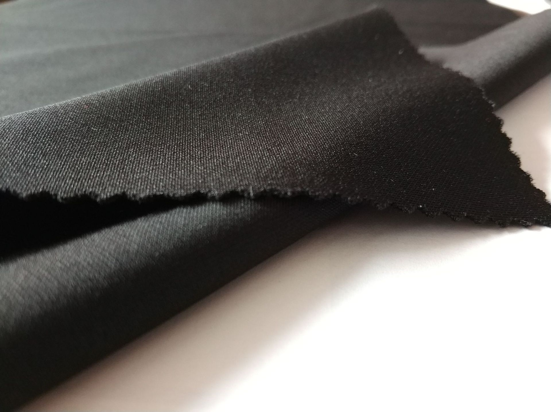 60s哥弟纹弹力针织面料弹力女裤面料罗马布锦棉面料现货供应