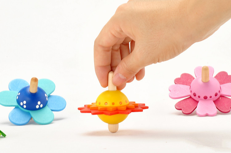 花儿陀螺 玩法很简单,直接旋转就可以,转起来很好看 椴木,榉木制作