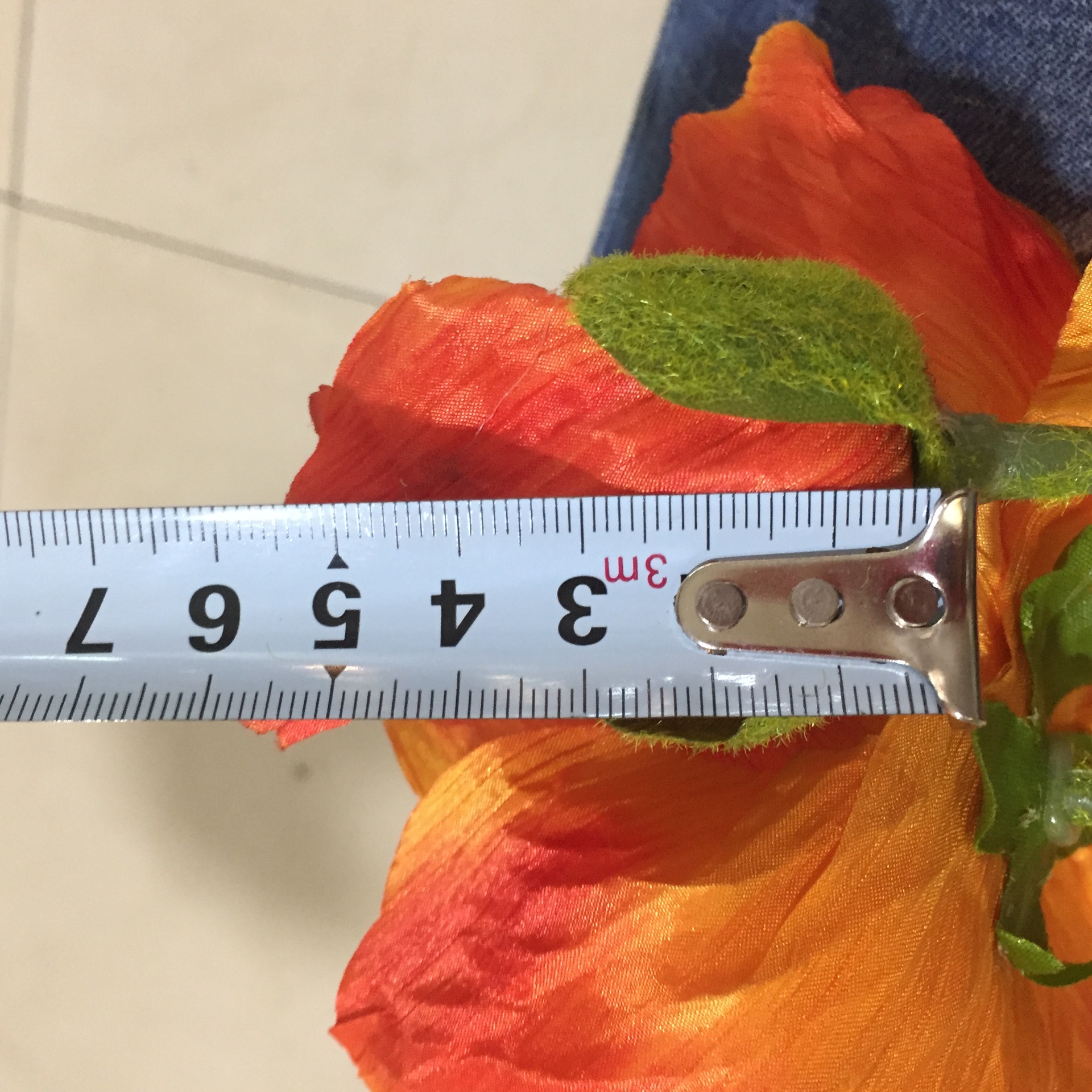 100 厘米,有花的部分长度60厘米,一个大花一个花苞,大花的直径15厘米