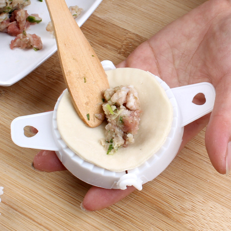 9万个厨房手动包饺子神器塑料捏饺子夹家用包饺子模具带福字6.5cm￥0.
