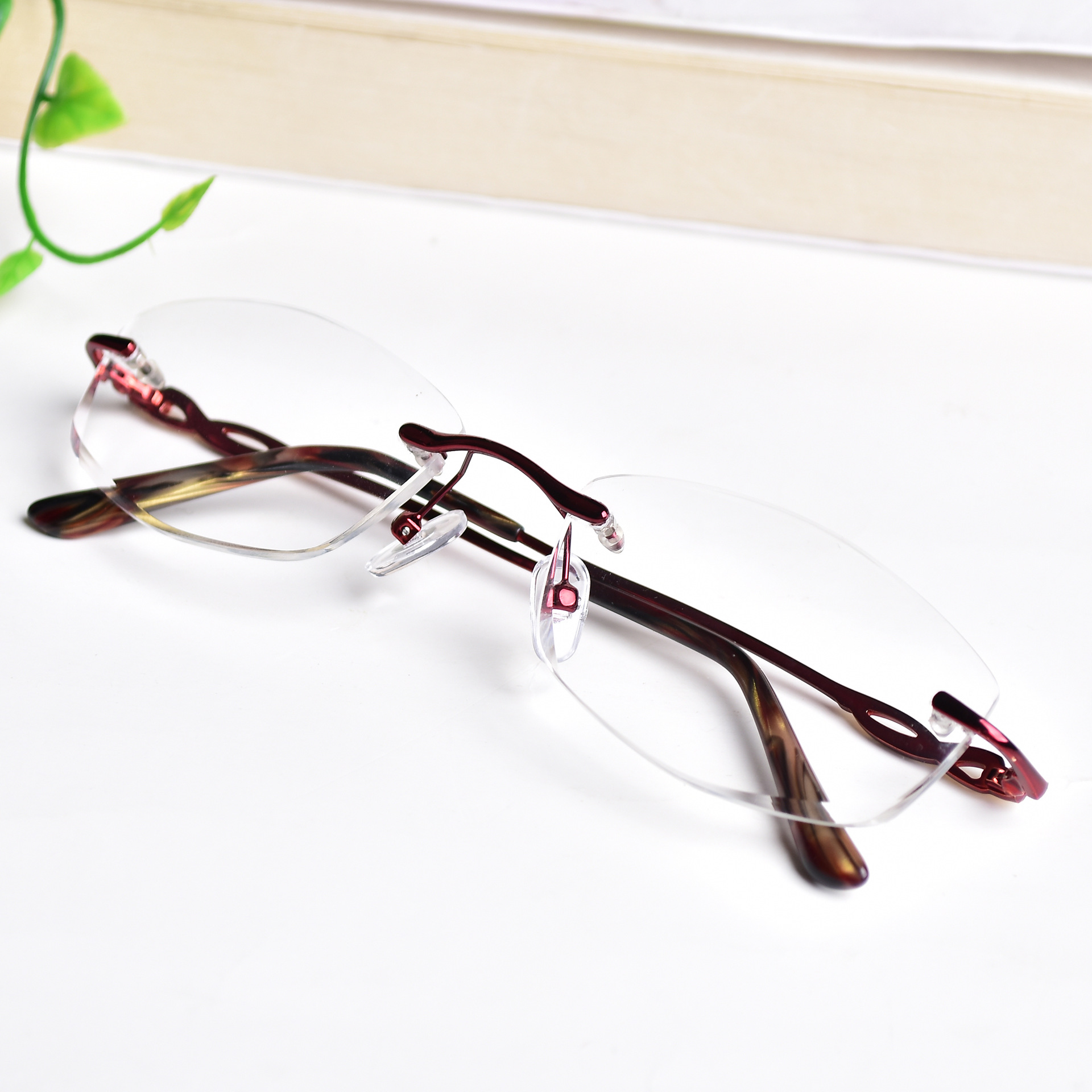 世行天然水晶石头眼镜时尚女式无框打孔平光镜东海厂家批发