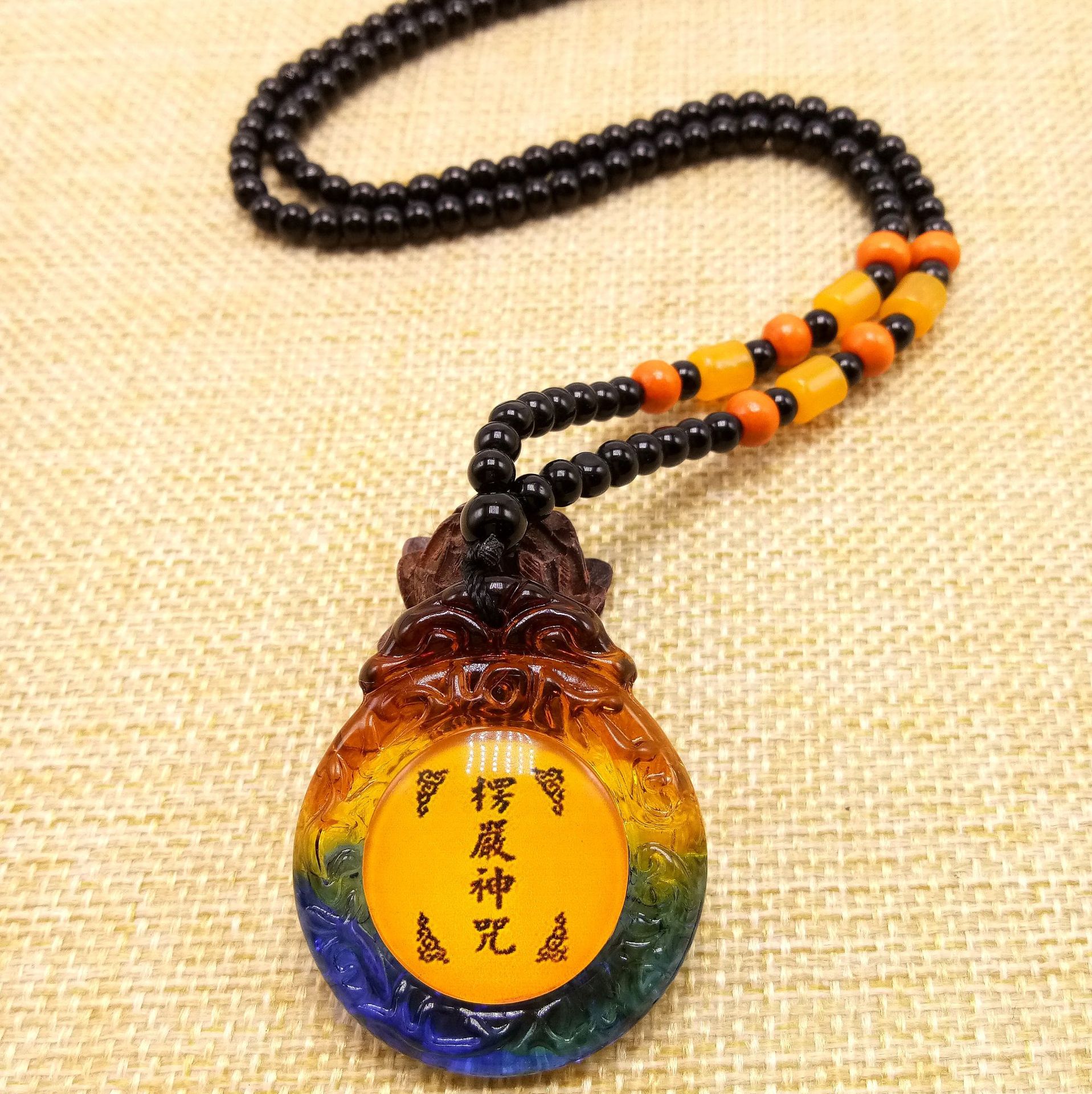 新款仿琉璃楞严咒项链男女通用护身楞严咒挂件毛衣链结缘品