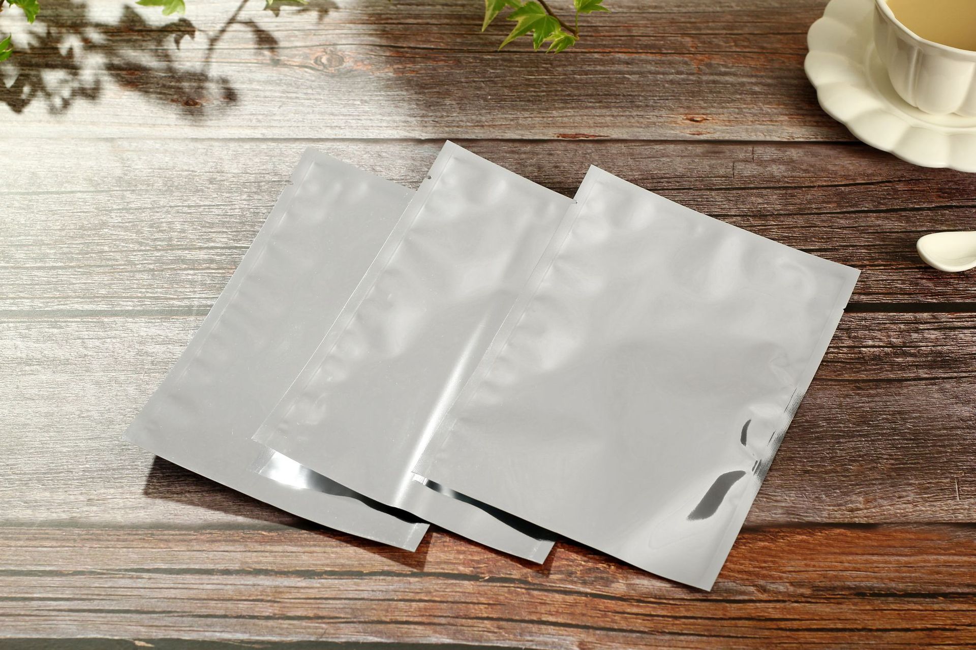 镀铝阴阳平口袋三边封食品包装袋铝箔真空袋半透明塑料袋现货定做