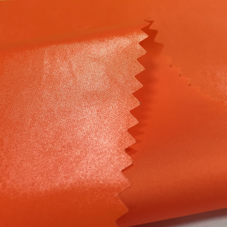 亮面羽绒服面料【40d亮pu】高档超级防水免洗亮皮漆皮防绒布