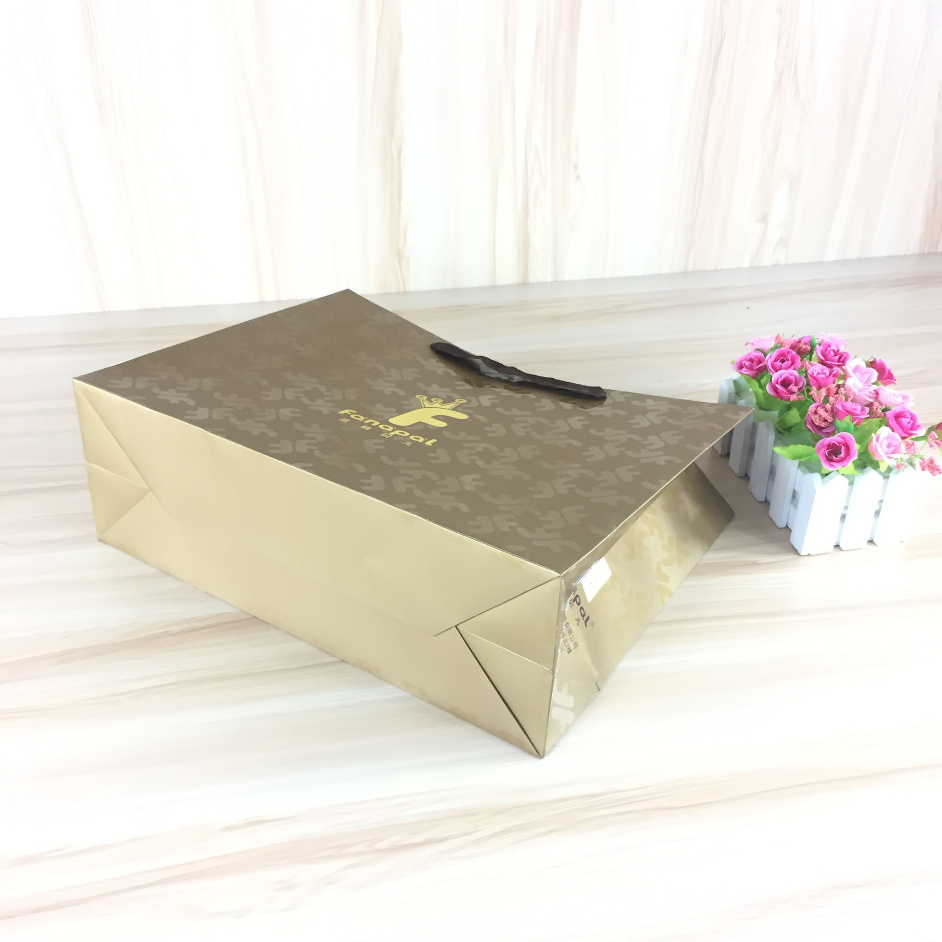 uv光油外贸手提纸袋 铜版纸服装袋子 厂家批发定制礼品包装