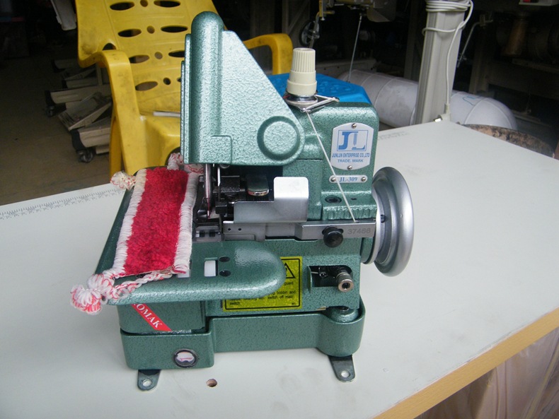 专业批发供应 地毯包边机 309厚料接布机 汽车脚垫包边三线渔网机