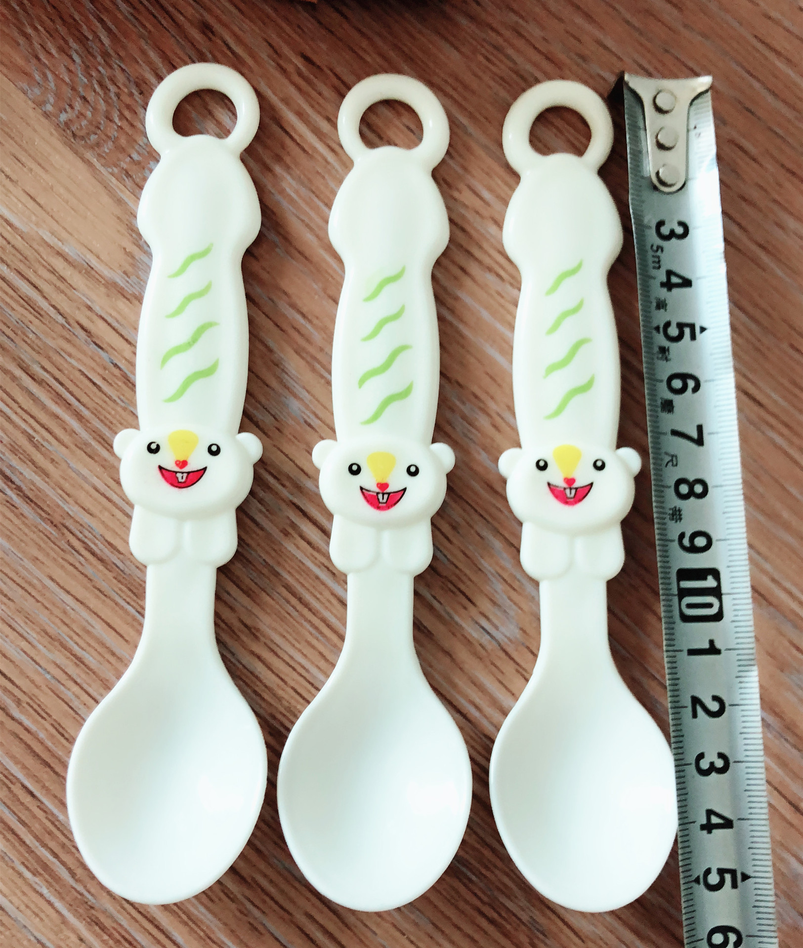 15区22号 卡通笑脸熊勺子可爱儿童勺子婴儿勺 一元店日用百货批发