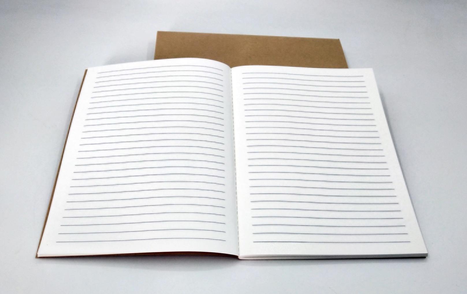 牛皮纸32k车线本厂家定制简约丝印刷图案记事本锁线本定做logo