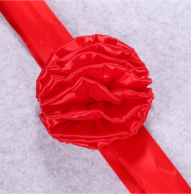 批发喜庆大红绸布剪彩大红花红绸布舞狮腰鼓八美缎布庆典装饰