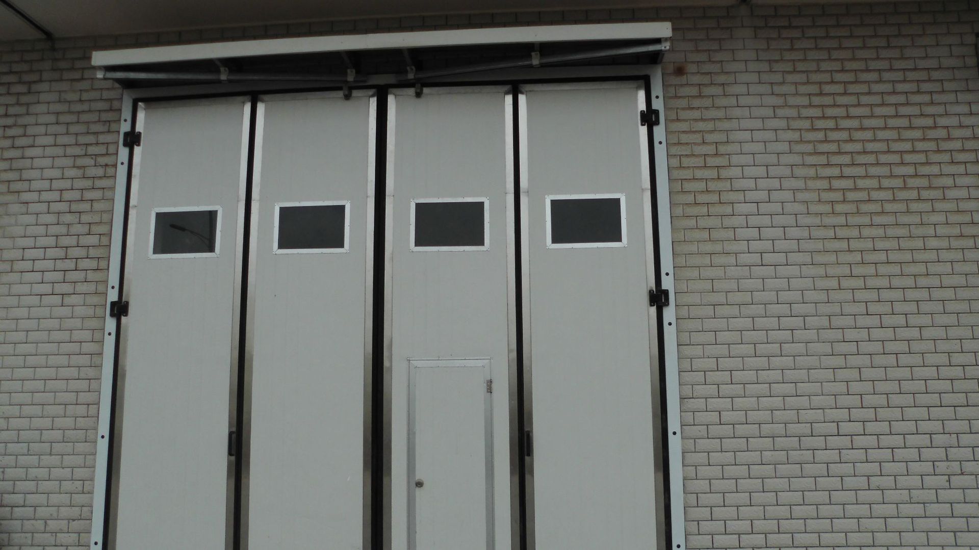 厂家供应厂房仓库折叠门 广州德玛电动大型工业折叠门工业提升门