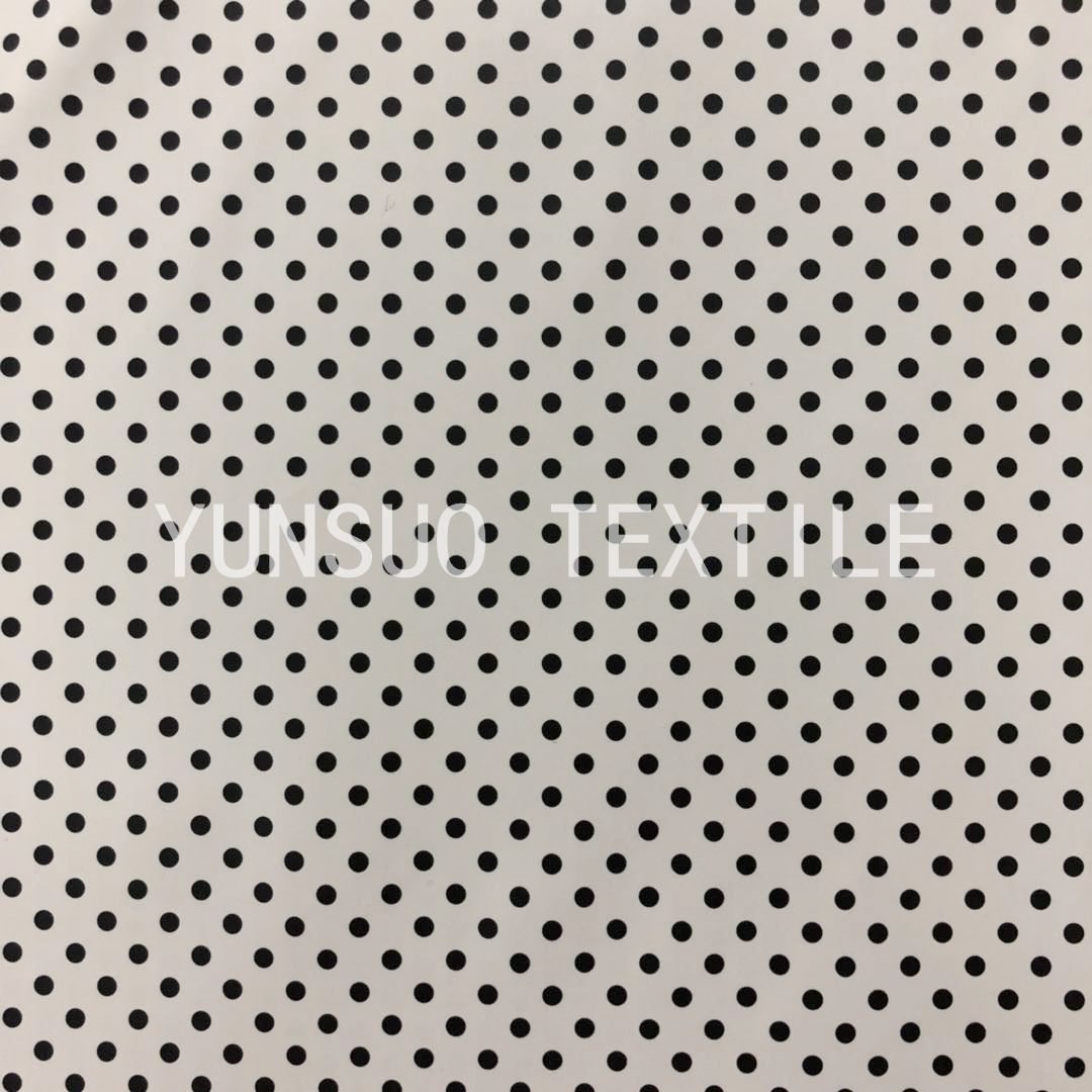 白底黑点 印花人造革 pu童装