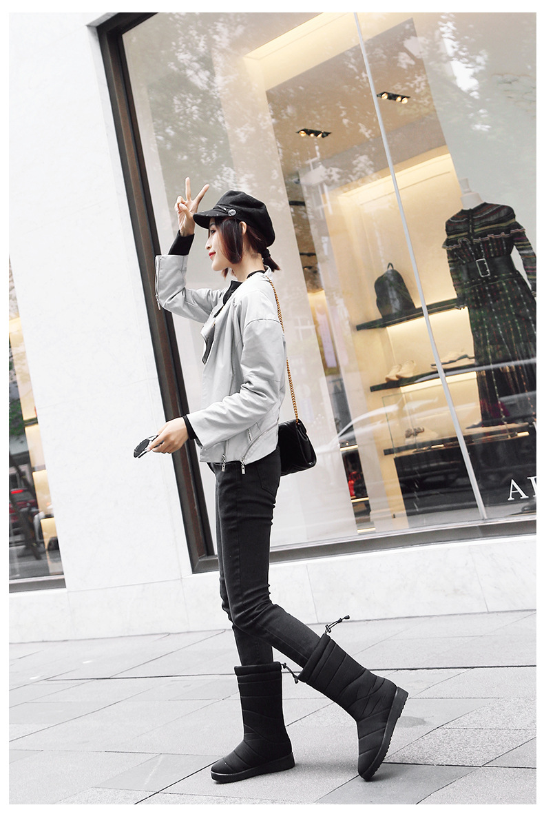 新款冬季女士流苏加绒雪地靴中筒坡跟保暖女靴子防水防滑女款靴