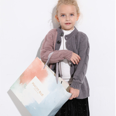 peacock blue轻奢童装品牌18年秋冬新款不对称拼色双色毛衣女童