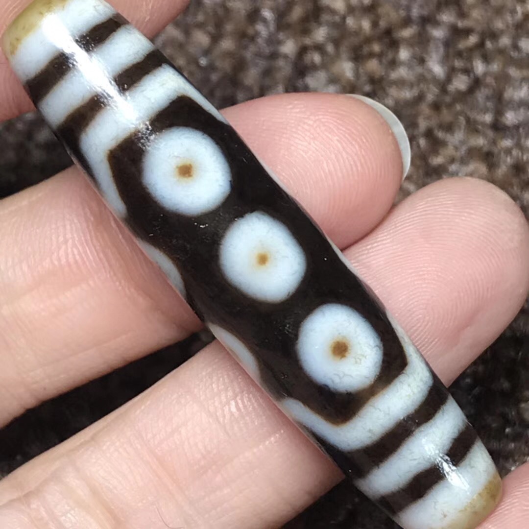 藏传老料高油包浆【十眼天珠】,尺寸:52*11mm