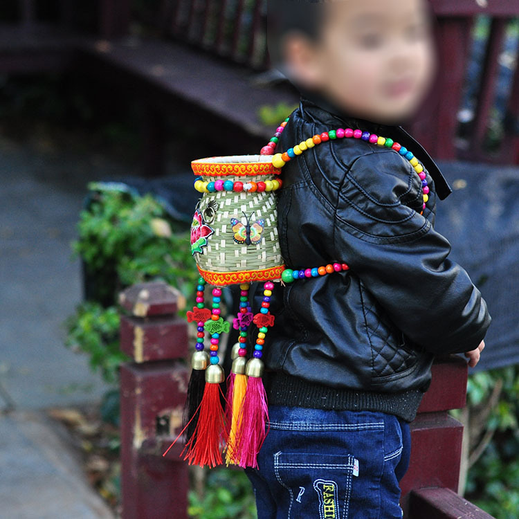 云南丽江儿童手工竹编鱼篓流苏背篓小孩子旅游休闲竹背篓景区热卖