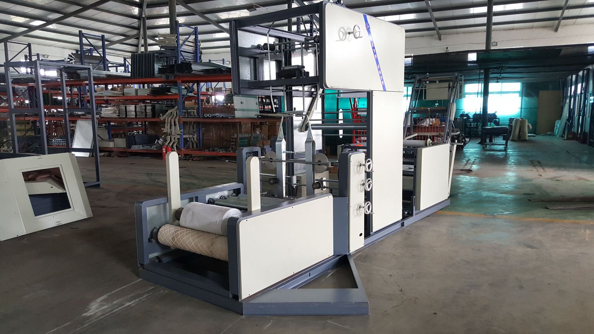 厂家直销 新型电脑控制 编织袋折边机 整卷筒布移位折m边