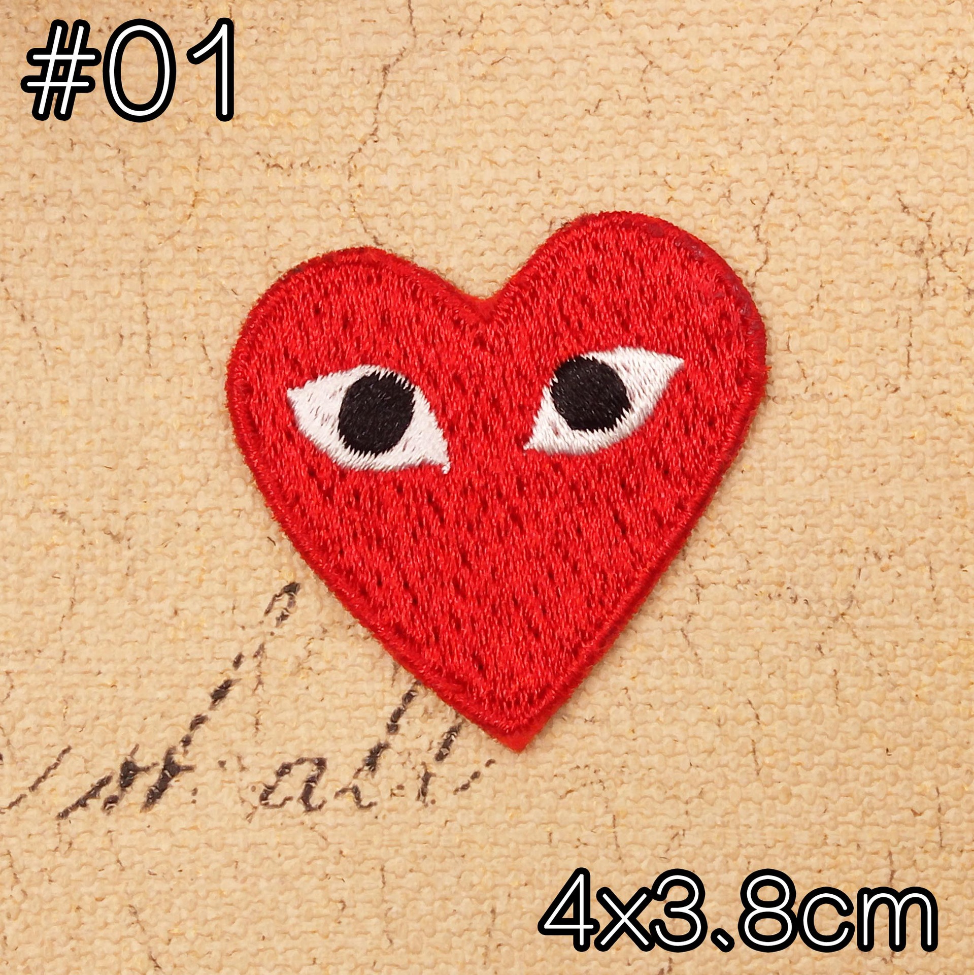 正品背胶银线金色爱心眼睛川保久玲眼睛绣花章 刺绣布贴 厂家订制