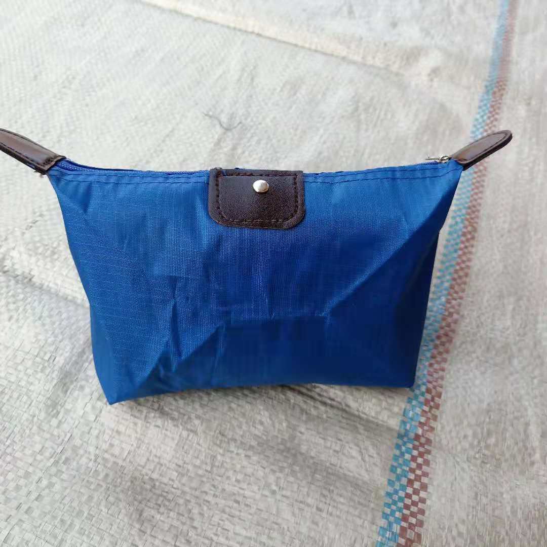 热销旅行化妆包袋现货涤纶包旅行收纳洗漱包双肩旅行收纳包折叠