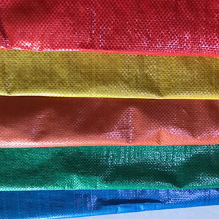 厂家直销多款彩色加宽塑料半成品编织布 特宽加厚塑料编织卷布