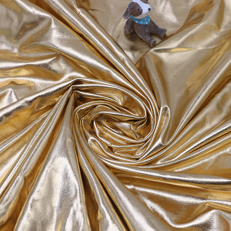 厂家直销涤纶面料舞台演出服氨纶烫金布四面弹力针织满版烫金面料