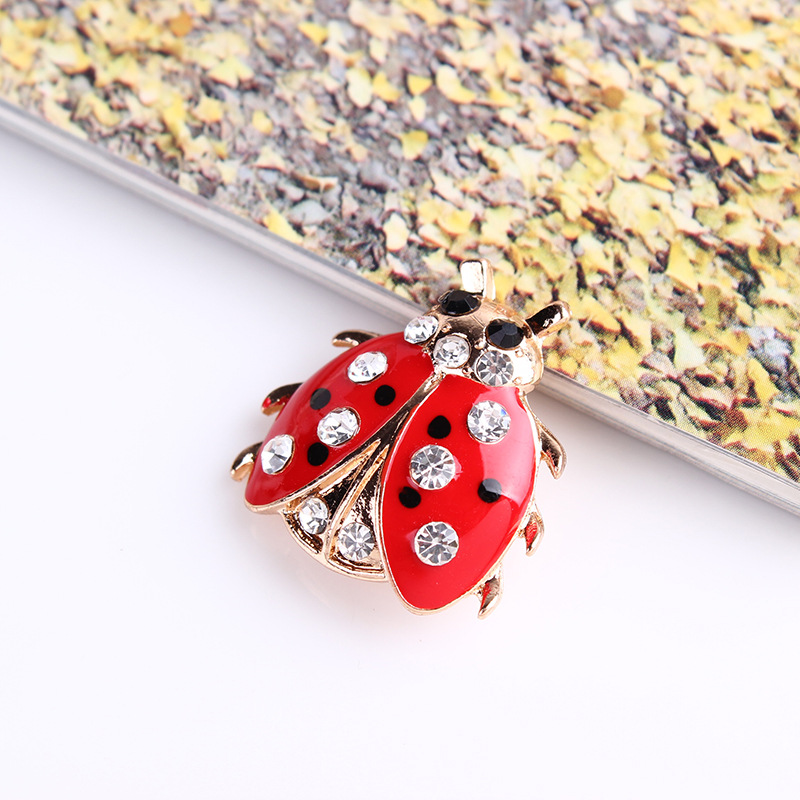 速卖通热销韩 版时尚七星瓢虫胸针 男女衣饰胸花别针 鞋包配饰