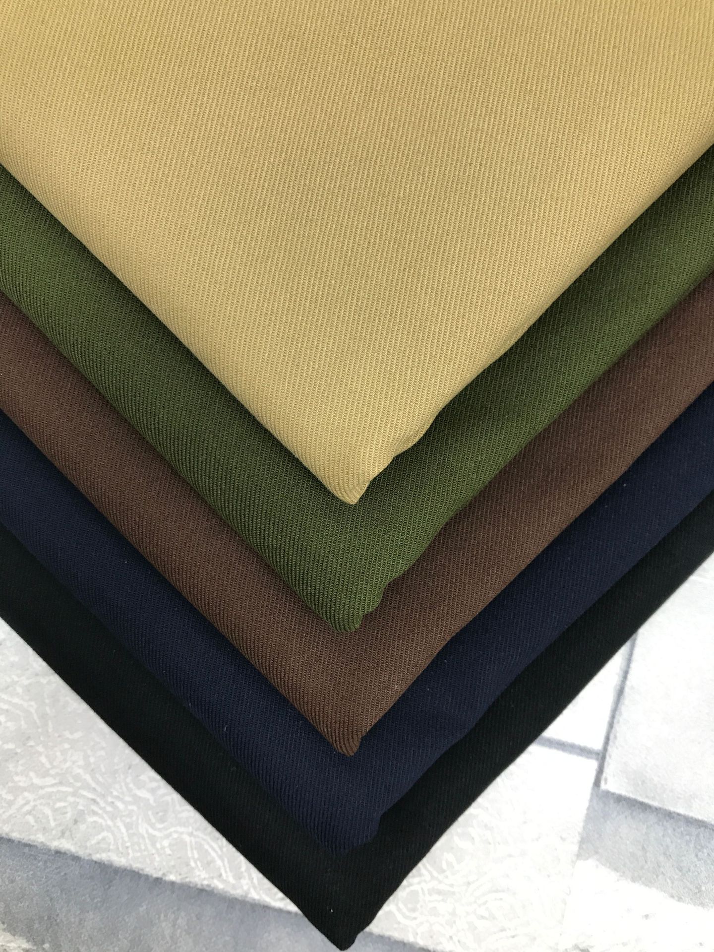 现货供应纯棉弹力布 双面斜弹力600 童装休闲外套裤装服装面料